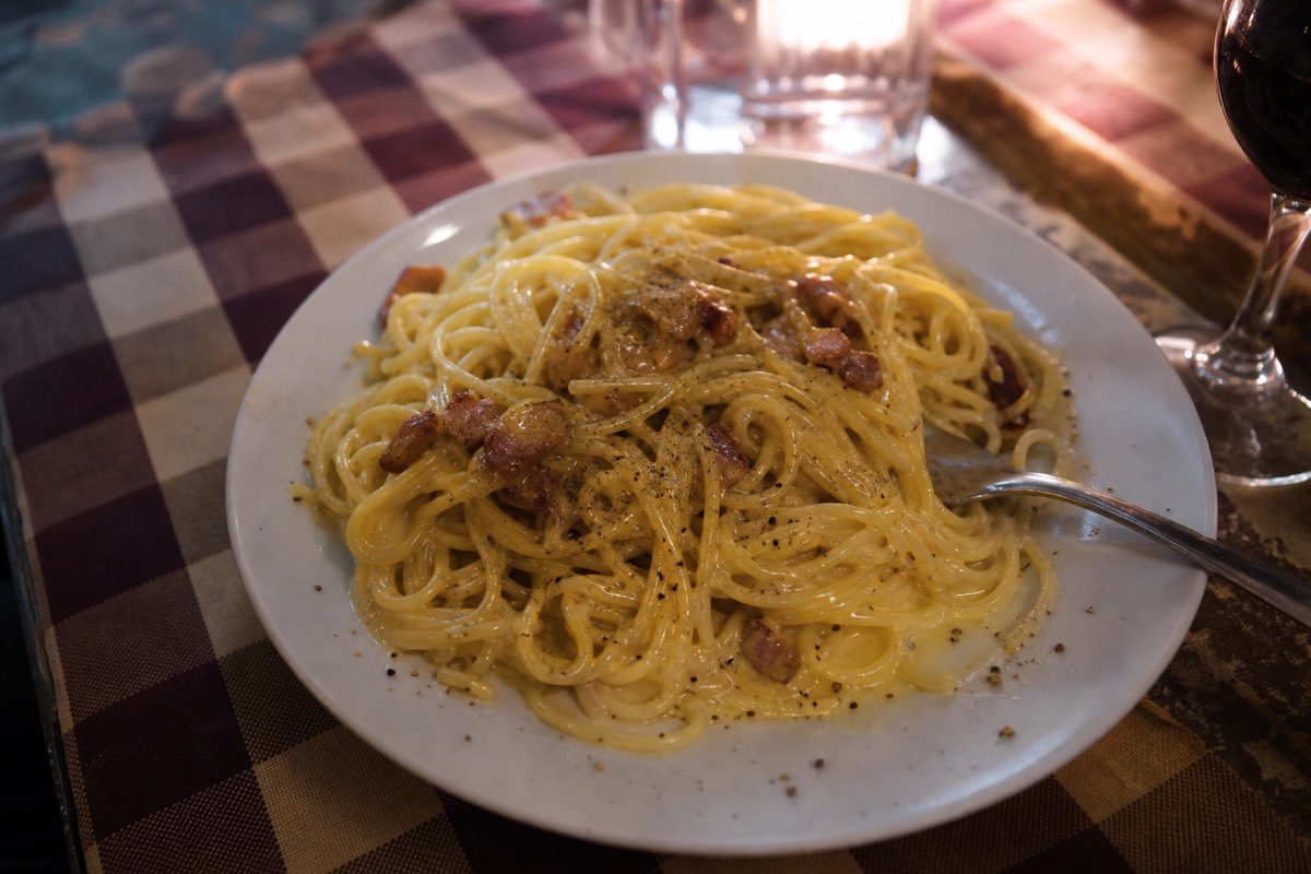 A plate of carbonara, one of Rome's signature pasta dishes